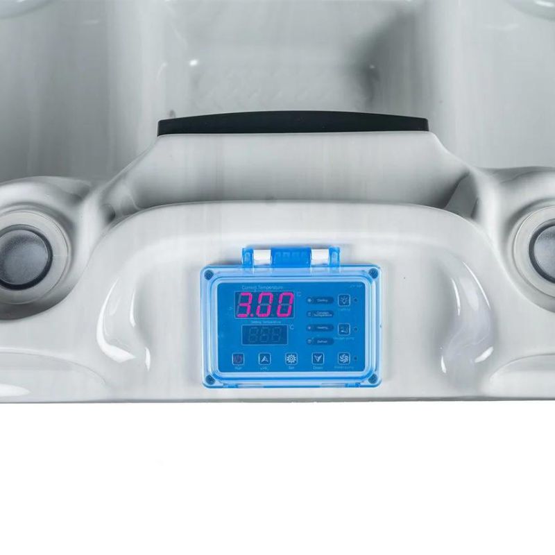  "Close-up of the control panel for the Elevate Contrast Ice Bath with current by Passion Ice Baths and Wim Hof, showing a digital temperature display set at 3.0°C. The white interior of the bath features built-in seating and jets."