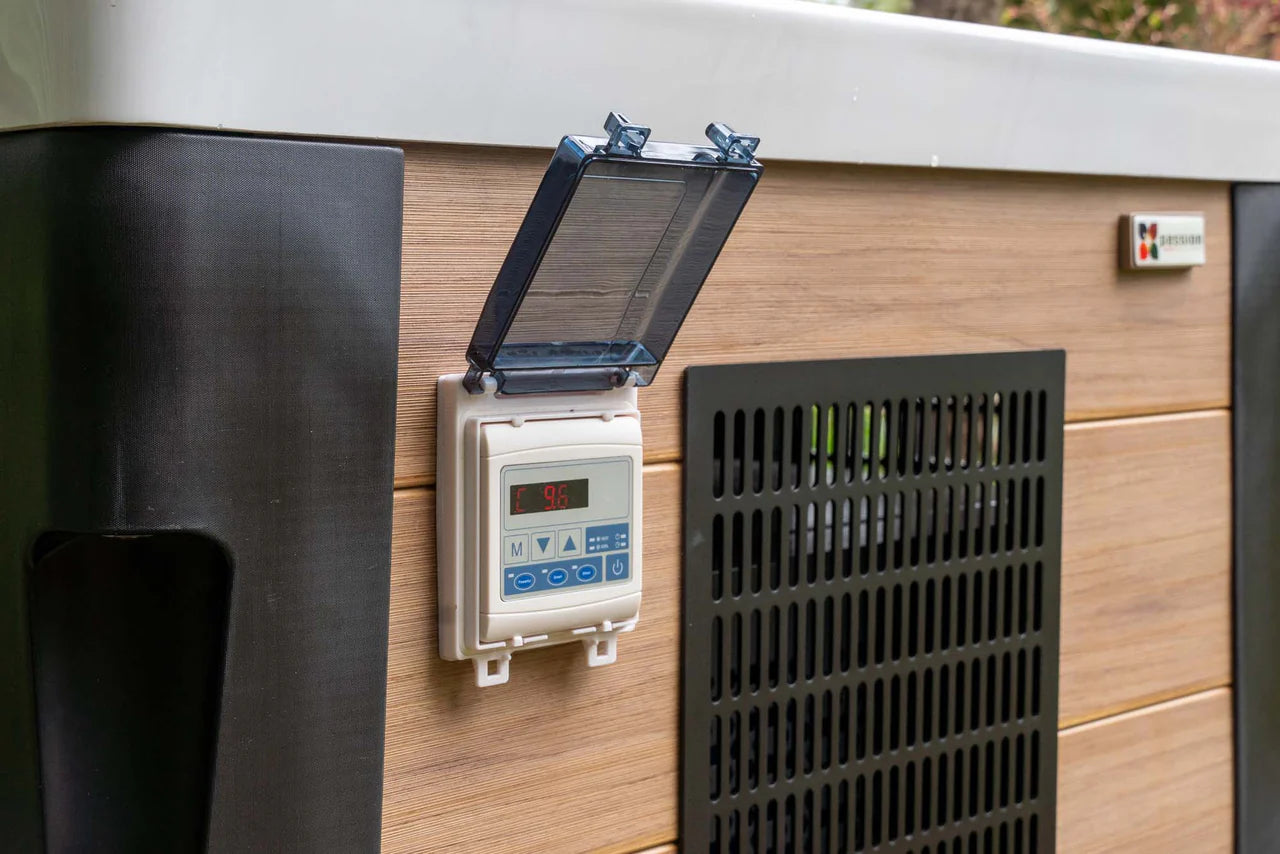 "Close-up of the control unit on the Breeze Ice Bath with current by Passion Ice Baths and Wim Hof, showing a digital display and control buttons on the wood-look exterior of the rectangular ice bath."